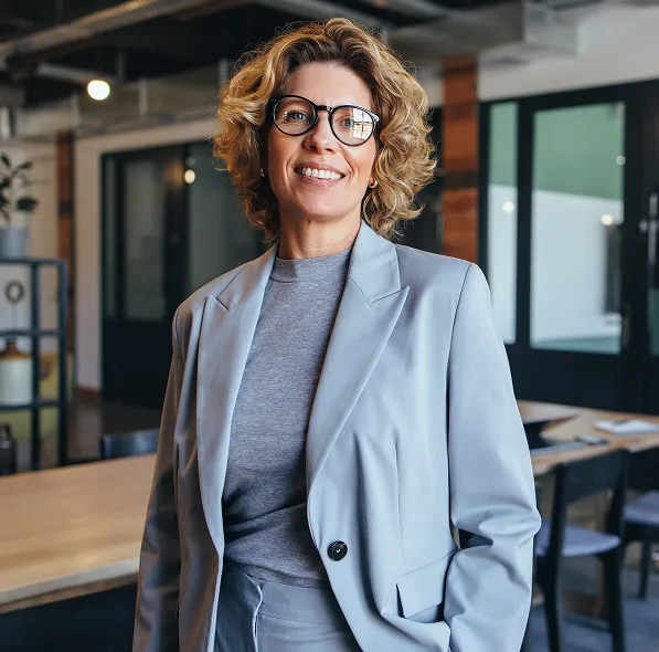 Smiling business professional in modern office