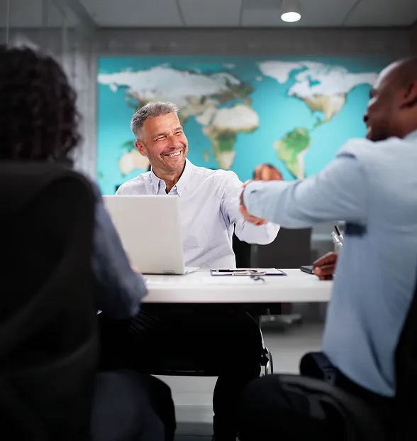 Business professionals collaborating in a modern office meeting